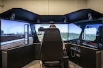U.S Air Force Staff Sgt. Corey Beecher, assigned to the 103rd Logistics Readiness Squadron, uses a driving simulator April 4, 2023, at Bradley Air National Guard Base, Connecticut. The simulator is used to practice driving skills in various scenarios and military vehicles.