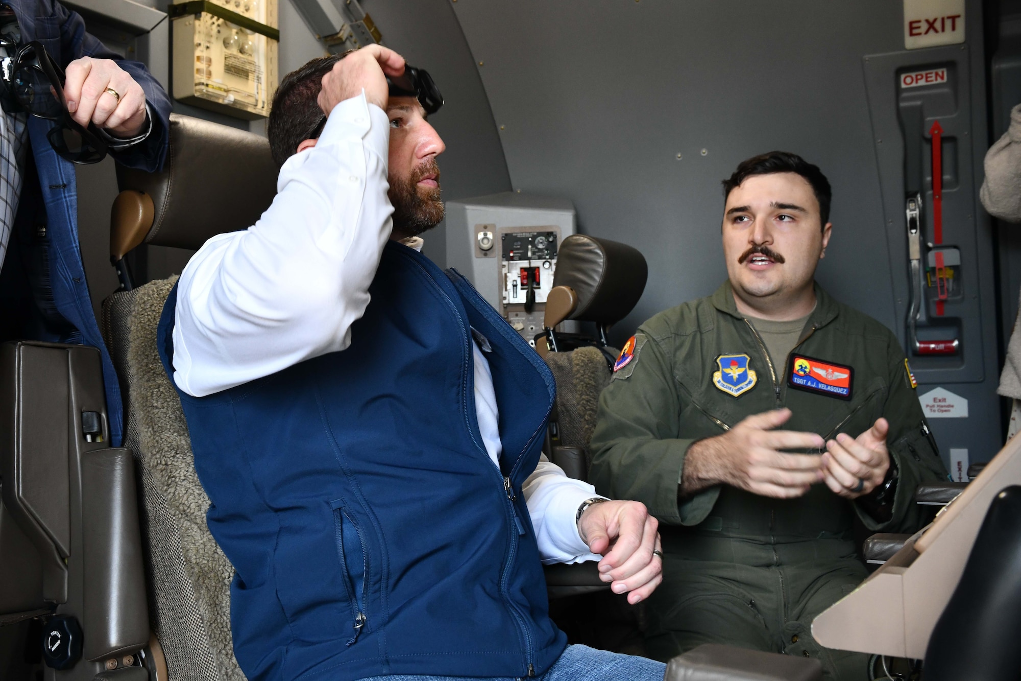 U.S. Air Force Tech. Sgt. Anthony Velasquez, 56th Air Refueling Squadron noncommissioned officer in charge of wing current operations, showcases the air refueling operator station of a KC-46 Pegasus to Markwayne Mullin, U.S. senator for Oklahoma, during a tour at Altus Air Force Base, Oklahoma, April 6, 2023. The KC-46 is able to refuel most receiver-capable aircraft. (U.S. Air Force photo by Airman 1st Class Miyah Gray)