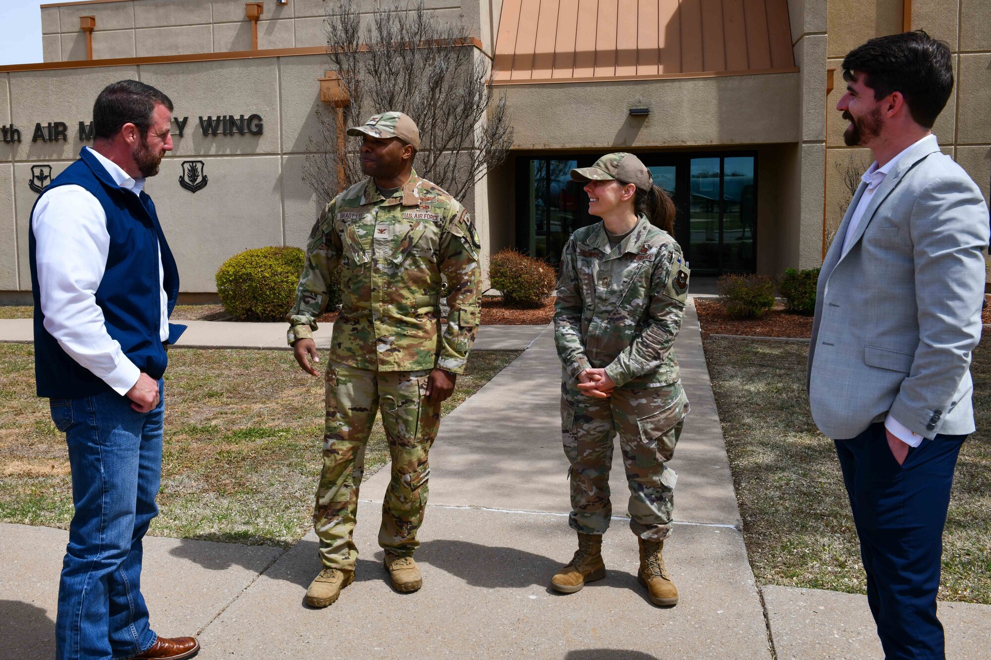 U.S. Air Force Col. Patrick Brady-Lee, 97th Air Mobility Wing vice commander, left center, and Chief Master Sgt. Sue Thompson, 97th Mission Support Group senior enlisted leader, right center, greet Markwayne Mullin, U.S. senator for Oklahoma, far left, and Thomas Cohrs, field representative, during a tour at Altus Air Force Base (AFB), Oklahoma, April 6, 2023. This was Mullin’s first visit to Altus AFB since taking office in January 2023. (U.S. Air Force photo by Airman 1st Class Miyah Gray)
