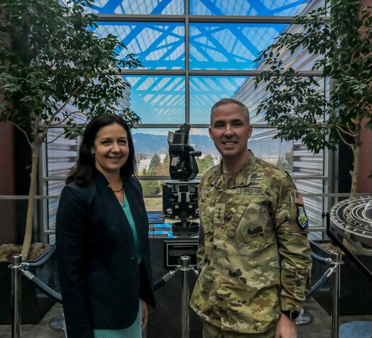  U.S. Space Force Lt. Gen. Stephen N. Whiting, Space Operations Command commander, poses for a photo with the Honorable Kristyn Jones, Assistant Secretary of the Air Force for Financial Management Performing the Duties of the Under Secretary of the Air Force, at SpOC Headquarters, Peterson Space Force Base, Colo., April 11, 2023. Jones came to SpOC to learn about its mission to generate, present and sustain combat-ready space and combat support forces to combatant commands to deliver space effects. (US. Space Force photo by SSgt Jose A. Rodriguez Jr)