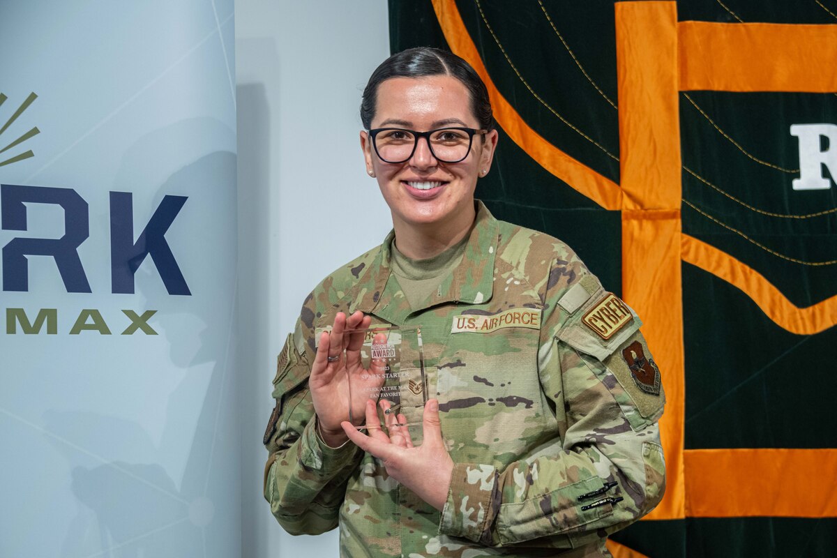 Staff Sgt. Kristina Smathers, 42nd Communications Squadron, voted fan favorite, pitched the concept for an Assignment Swap platform at the annual Spark at the Max on April 7, 2023. The Spark tank-style event invests in the innovative and problem-solving ideas of Airmen and Guardians to improve readiness, recover Airmen's time, save costs, and increase the force's lethality. (U.S. Air Force photo by Sean Ross)