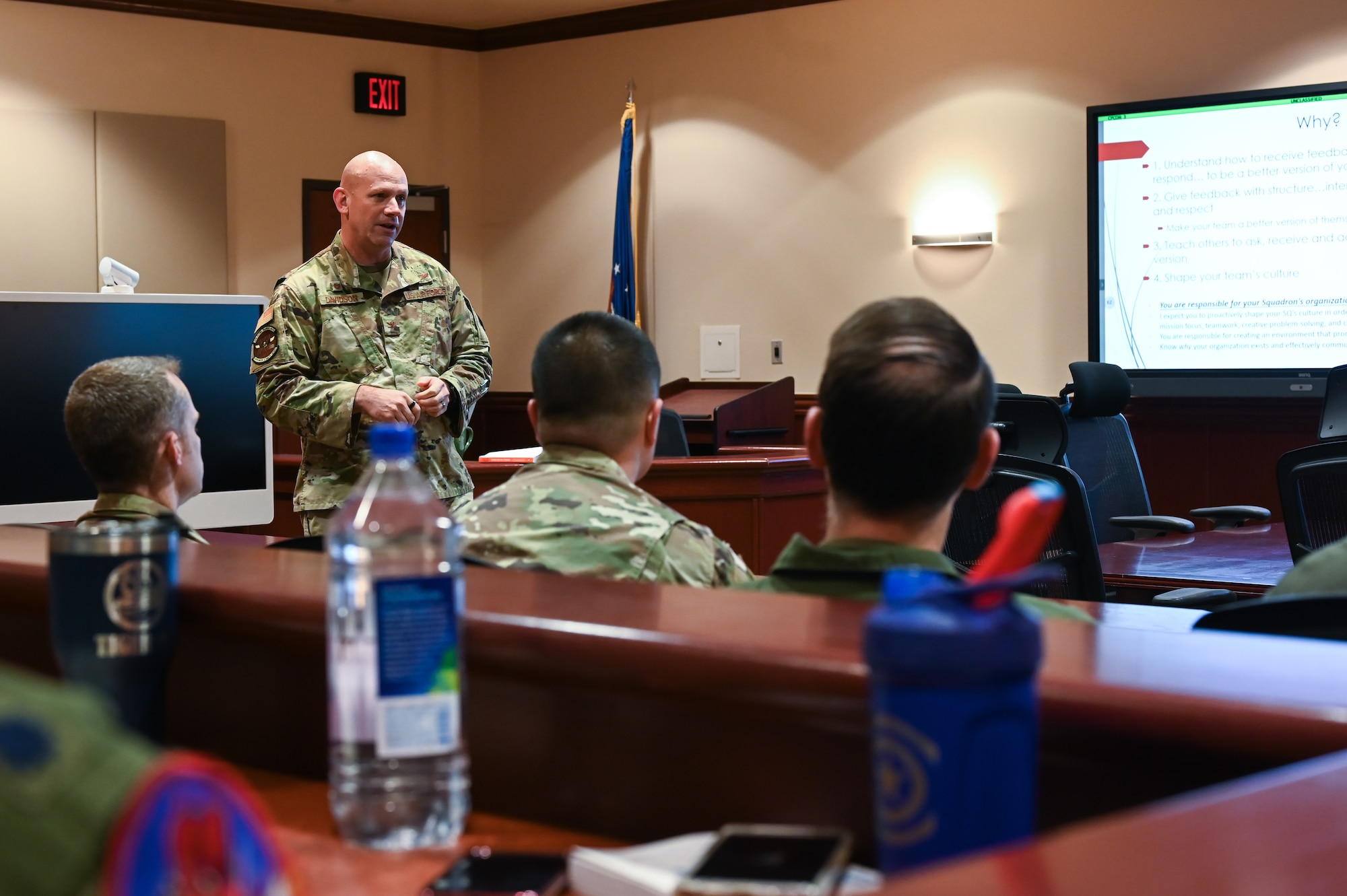 U.S. Air Force Col. Davidson, 47th Flying Training Wing commander, leads a professional development discussion at Laughlin Air Force Base, Texas, on March 22, 2023. Col. Davidson emphasized the importance of creating a continuous learning and development culture where feedback is embraced as a valuable tool for growth and improvement. (U.S. Air Force photo by Airman 1st Class Keira Rossman)