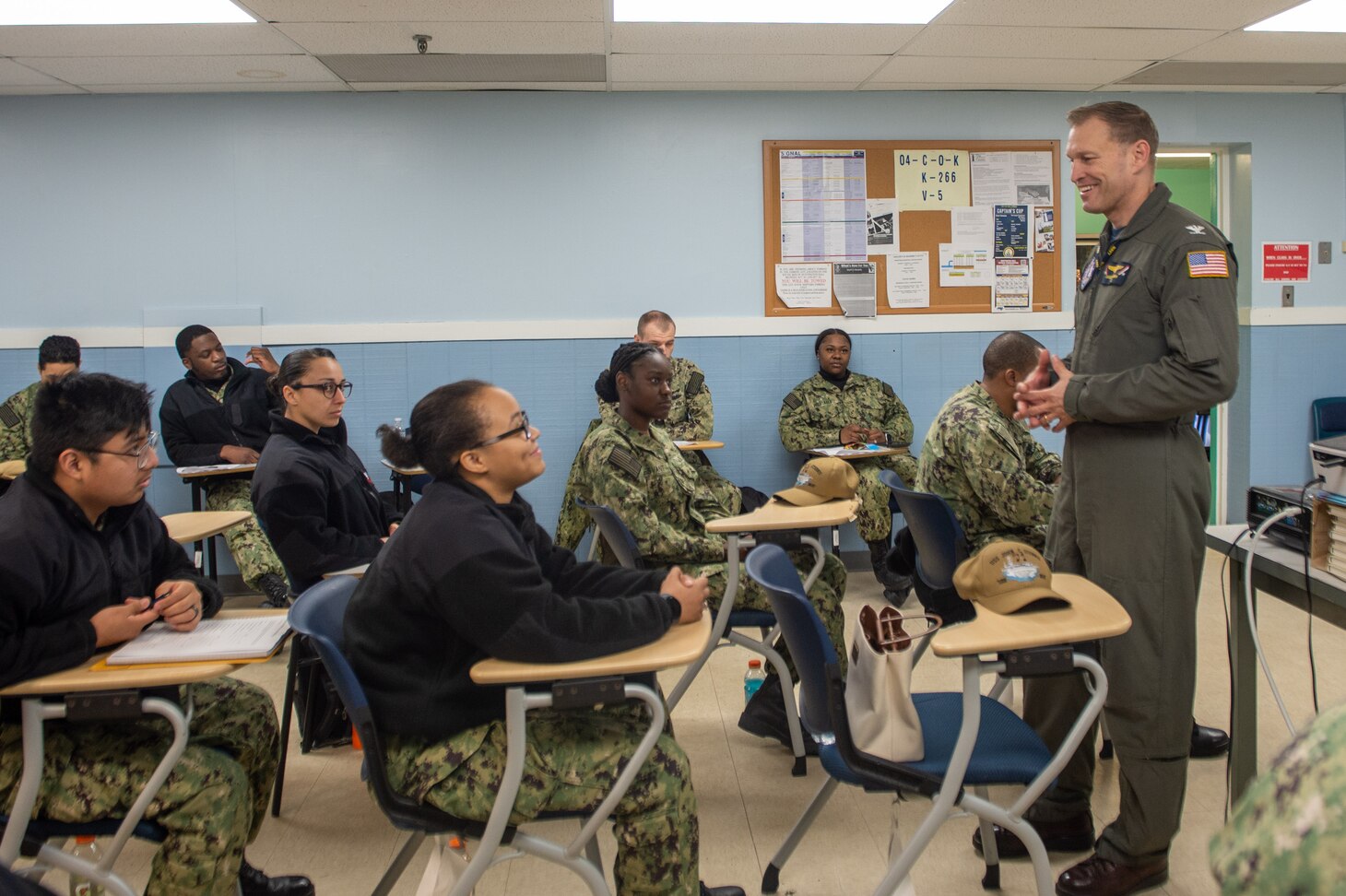 U.S. Navy Capt. Cassidy Norman, commanding officer of the Nimitz-class aircraft carrier USS John C. Stennis (CVN 74), speaks with new Sailors during a School of Ship brief at Huntington Hall, in Newport News, Virginia, Feb. 14, 2023. The John C. Stennis is in Newport News Shipyard conducting Refueling and Complex Overhaul to prepare the ship for the second half of its 50-year service life.