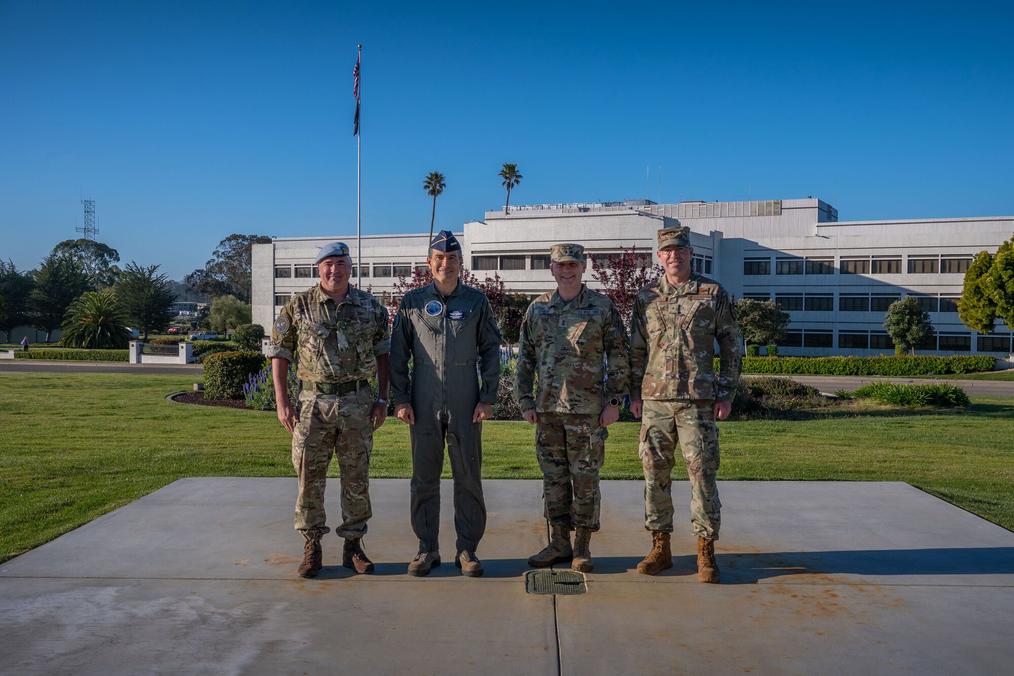 (From left to right) British Army Brigadier Paul Tedman, deputy director of U.S. Space Command’s strategy, plans, and policy directorate, Gen. Luis Carlos Córdoba Avendaño, Colombian Air Force (COLAF) commander, U.S. Space Force Maj. Gen. Douglas A. Schiess, Combined Force Space Component Command commander, and U.S. Air Force Brig. Gen. Sean Choquette, Air Force South Command vice commander, stand together for a group photo at Vandenberg Space Force Base, Calif., April 10, 2023. Córdoba led a delegation of industry and academia representatives to witness the launch of COLAF's second nanosatellite in partnership with EXOLAUNCH and SpaceX. The visit also included an in-depth pad tour of SpaceX's Space Launch Complex-4 and a sit-down meeting with Schiess to discuss on-going space cooperation efforts. (U.S. Space Force photo by Tech. Sgt. Luke Kitterman)