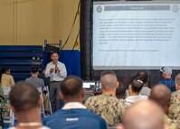 230412-A-NR779-1144 MANAMA, Bahrain (April 12, 2023) Cmdr. Anthony Baker, a U.S. Naval Forces Central Command chaplain, speaks during a mental health awareness event in Bahrain, April 12, 2023.