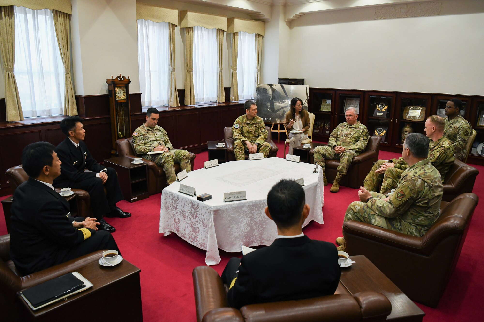 Leaders of United States Forces Japan, the 374th Airlift Wing, and the 319th Expeditionary Reconnaissance Squadron hold a meeting inside the Kanoya Air Base headquarters building during a visit to Kanoya Air Base, Japan, April 10, 2023. USFJ and 374th Airlift Wing command teams also met with Shigeru Nakanish, Kanoya mayor, and recognized Airmen from the 319th Expeditionary Reconnaissance Squadron. (U.S. Air Force photo by Staff Sgt. Spencer Tobler)