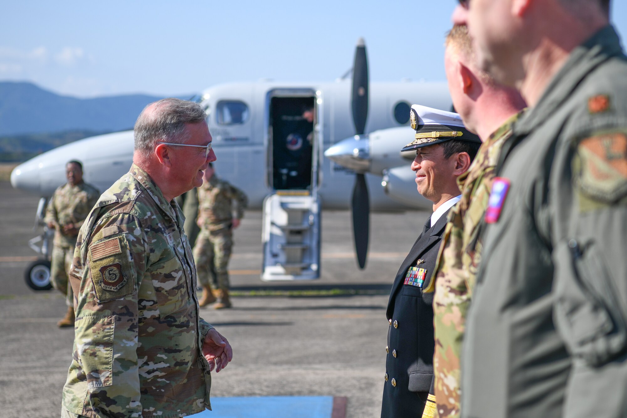 U.S. Air Force Lt. Gen. Ricky Rupp, United States Forces Japan and 5th Air Force commander, meets Japan Maritime Self Defense Force Rear Adm. Naochika Fujiwara, Fleet Air Wing One commander, during a visit at Kanoya Air Base, Japan, April 10, 2023. USFJ and 374th Airlift Wing command teams also met with Kanoya Mayor Shigeru Nakanish and recognized Airmen from the 319th Expeditionary Reconnaissance Squadron. (U.S. Air Force photo by Staff Sgt. Spencer Tobler)