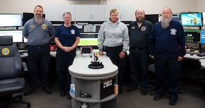 788th Civil Engineer Squadron dispatchers pose for a group photo.