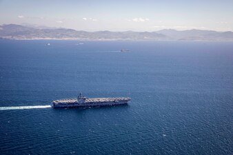 USS George H.W. Bush (CVN 77) transits the Strait of Gibraltar.