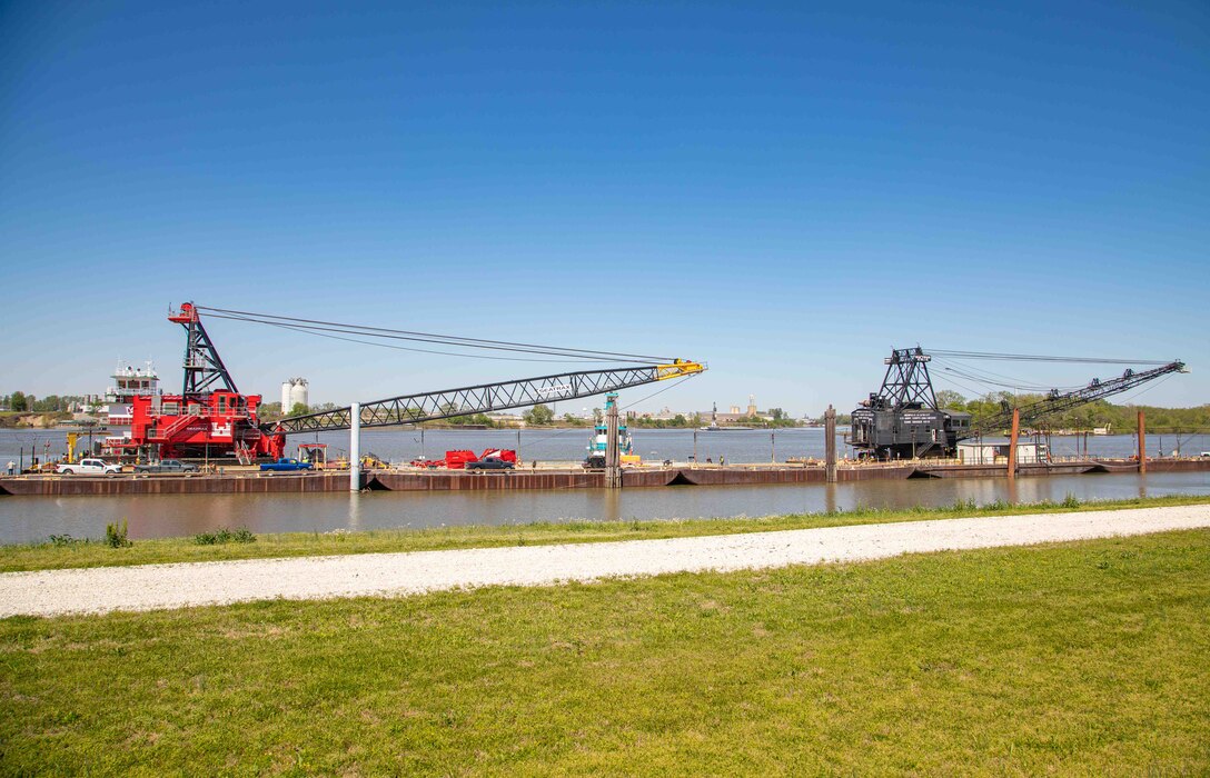 The Memphis District officially welcomed a brand new, $25.5 million Bank Grading Unit (BGU), April 11, 2023, when it docked at its new home port at Ensley Engineer Yard in Memphis, Tennessee. In the photo, the new BGU is docked next to the Memphis District's legacy dragline model.

The new BGU was built over a period of three years and is replacing the district’s legacy bank grader. With nearly 75 years of operations in the books, it’s safe to say the 1949 barge-mounted Bucyrus-Erie dragline model is ready for retirement.