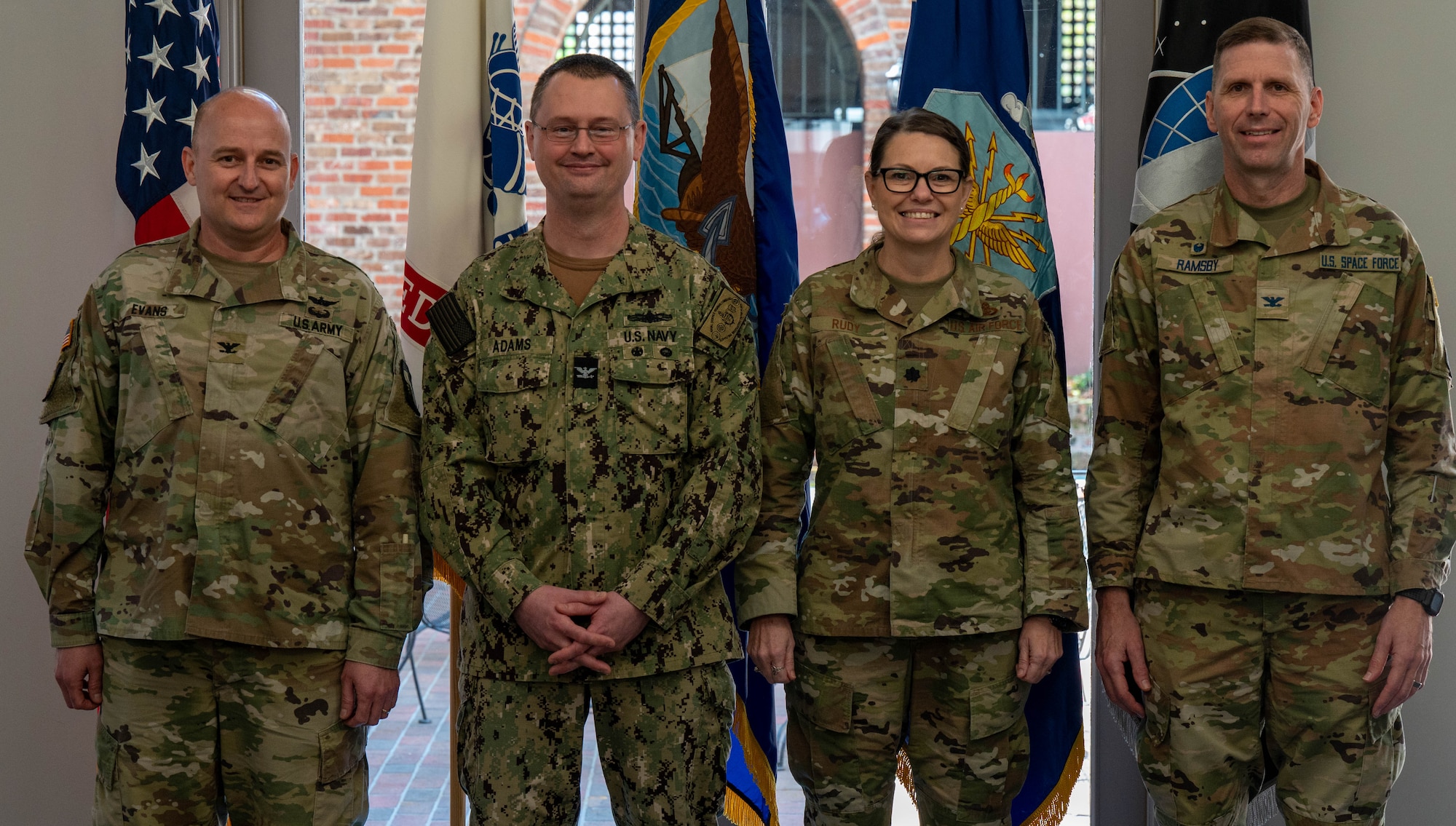 U.S. Army Col. Lee Evans (far left), chief, operations analysis division at United States Army Cadet Command, U.S. Navy Capt. Chris Adams (center left), director of officer development, Lt. Col. Julie A. Rudy (center right), assistant director of accessions policy at the office of the secretary of defense and Col. Corey M. Ramsby, Air Force ROTC commander, met at Maxwell Air Force Base, Apr. 5, 2023. They discussed issues in their respective branches ROTC programs and came up with solutions for them.  (U.S. Air Force photo by Airman Tyrique Barquet)