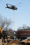 The North Dakota National Guard, shown here training, assisted with flood mitigation efforts by placing 1-ton sandbags by helicopter near White Earth east of Tioga April 12, 2023.