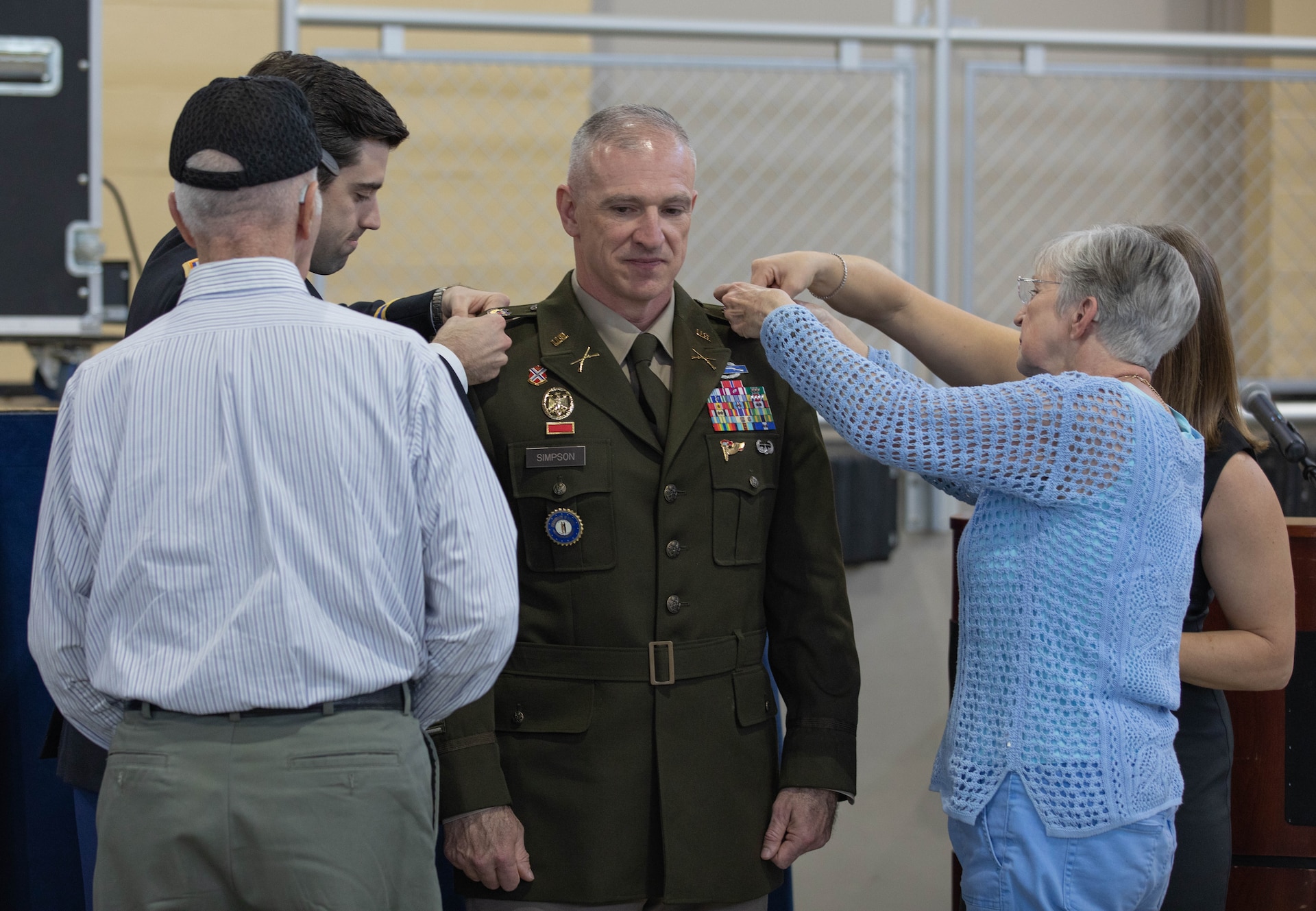 Lt. Col. Eddie Simpson speaks to the crowd of family and friends during his promotion ceremony at the Wellman Armory in Frankfort Apr. 12, 2023