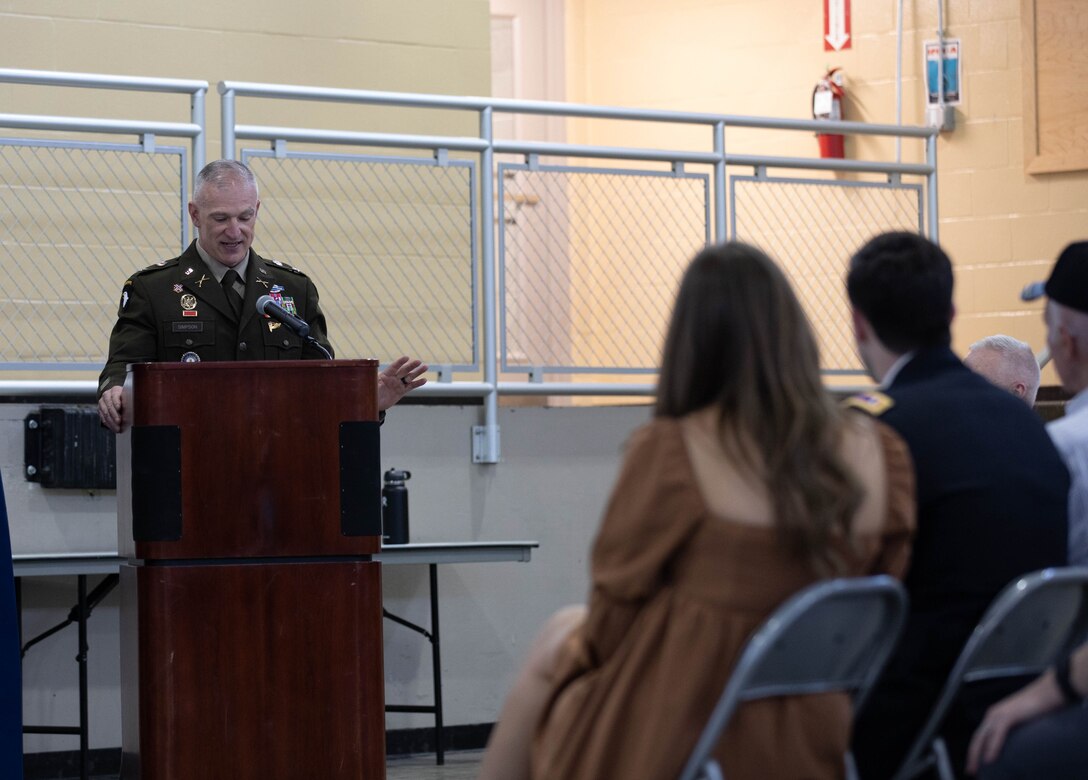 Lt. Col. Eddie Simpson speaks to the crowd of family and friends during his promotion ceremony at the Wellman Armory in Frankfort Apr. 12, 2023