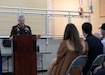 Lt. Col. Eddie Simpson speaks to the crowd of family and friends during his promotion ceremony at the Wellman Armory in Frankfort Apr. 12, 2023