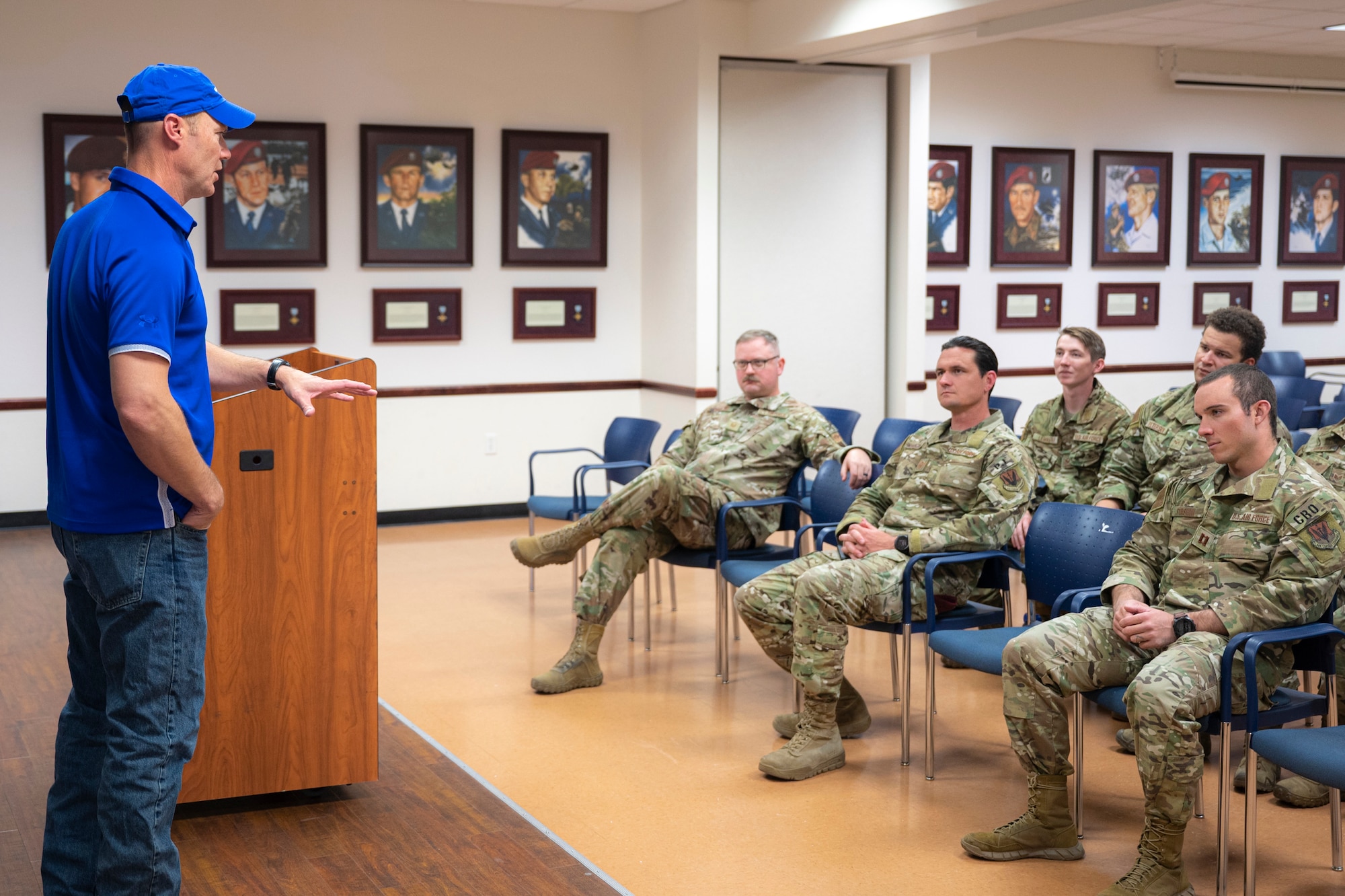 A photo of a speaker briefing a crowd