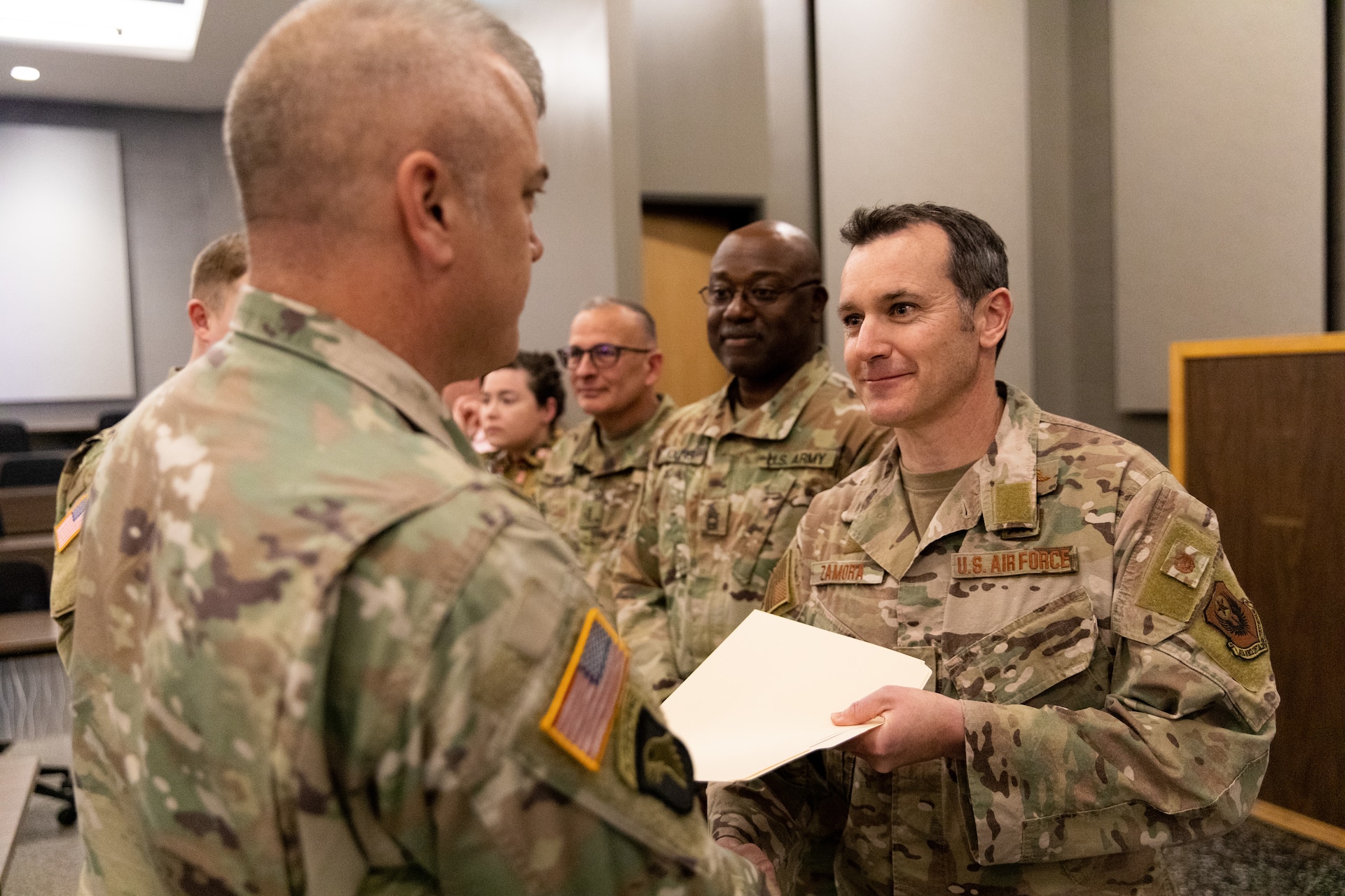 Kentucky National Guard Soldiers and Airmen were the first to receive a new state ribbon recognizing service with the State Partnership Program (SPP) in a ceremony at the Boone National Guard Center in Frankfort, Kentucky on April 13, 2023. The new ribbon, the Kentucky State Partnership Program Ribbon, was created to honor Soldiers and Airmen who enhance military-to-military relationships in subject matter expert engagement with one of Kentucky’s partner nations, Ecuador and Djibouti. (U.S. Army photo by Andy Dickson)
