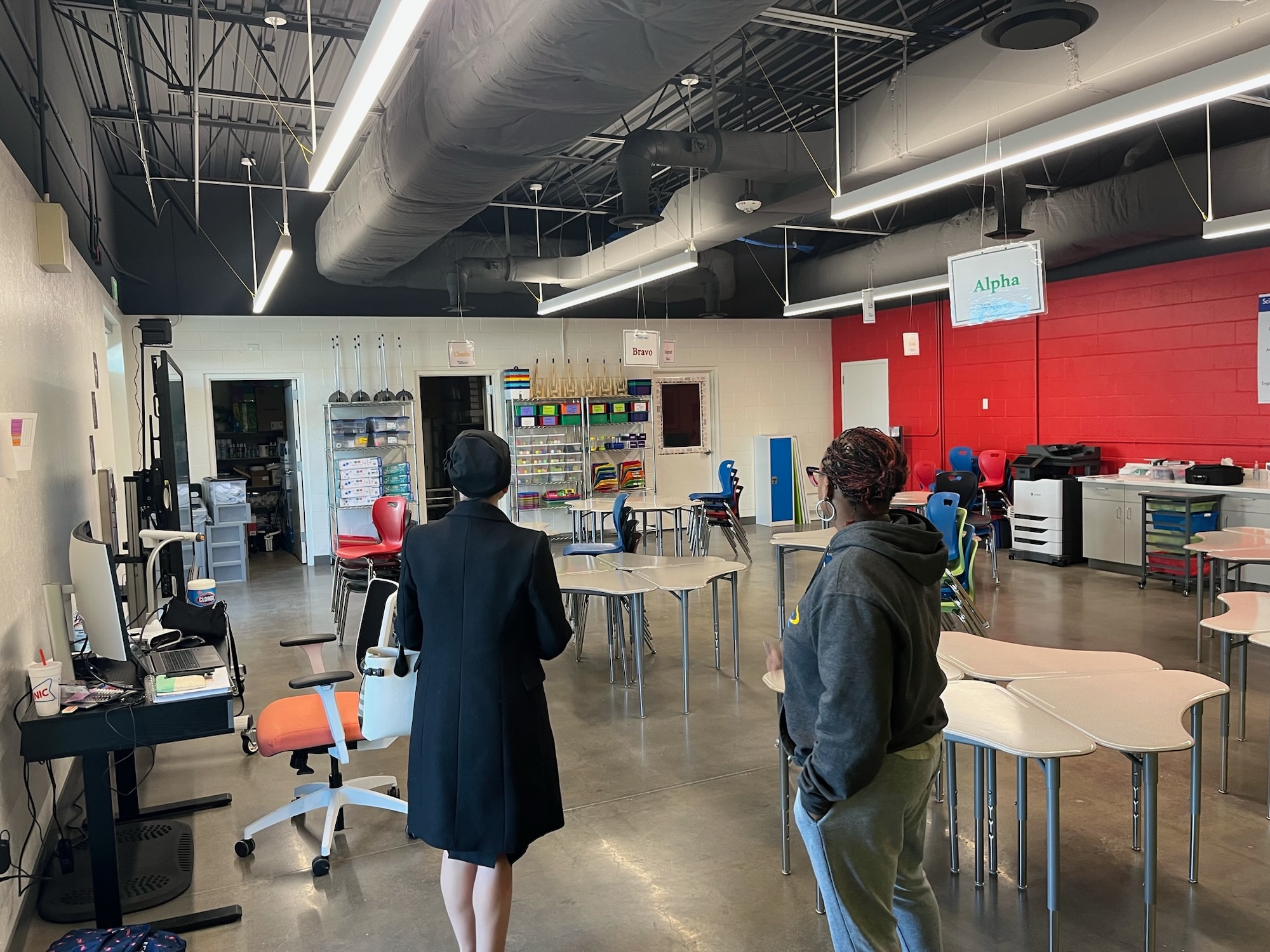 Col. Evan Kirkwood, 152nd Airlift Wing Commander, Trustee Beth Smith, Washoe County School Board District D and Tiffany Davis, StarBase Sierra Director tour the StarBase facilities located at the Nevada Air National Guard Base in Reno, Nev.