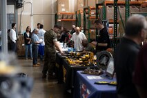 General Services Administration employees and vendors set up display booths for a customer appreciation day, Marine Corps Base Hawaii, April 12, 2023. The purpose of the event was for vendors to discuss requirements with unit representatives and showcase new items and supplies. (U.S. Marine Corps photo by Chief Warrant Officer 2 William Faffler)