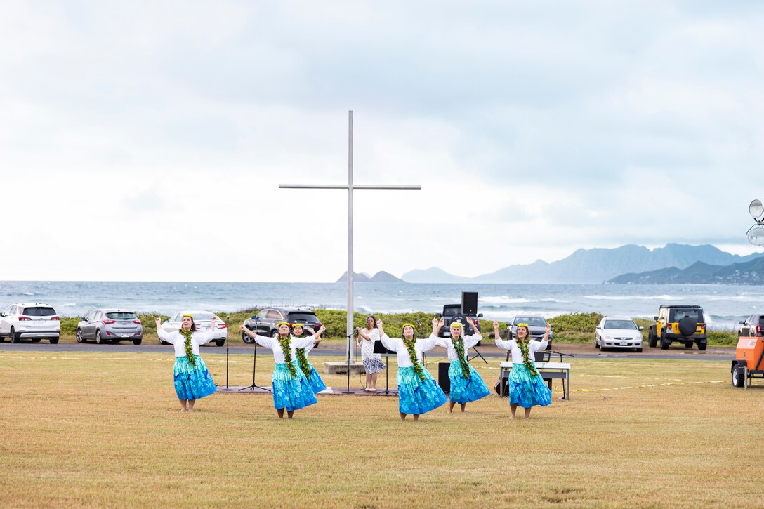 A group of Hawaiian hula dancers perform during the Annual Easter Sunrise Service, Landing Zone Eagle, Marine Corps Base Hawaii, April 9, 2023. The service was open to service members and their families, and was held in celebration of Easter Sunday. (U.S. Marine Corps photo by Cpl. Samantha Sanchez)