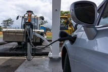 An EV ARC 2020 charging station charges a 2023 Chrysler Pacifica, Marine Corps Base Hawaii, Mar. 21, 2023. MCBH has added three Zero Emission Vehicles and two solar-powered charging stations to the base. The new Z.E.V.s allow MCBH to begin neutralizing greenhouse gases emitted by fossil-fueled vehicles. (Marine Corps photo by Cpl. Cody Purcell)