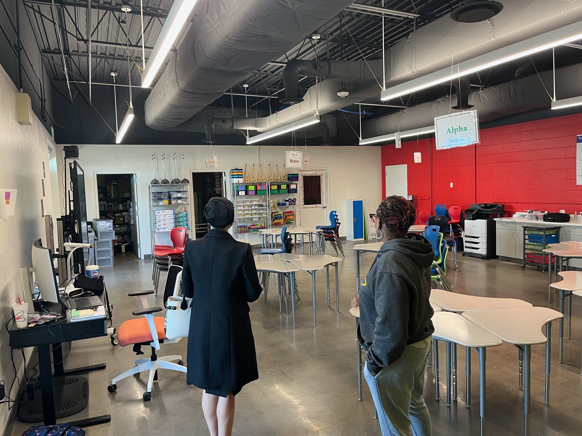 Col. Evan Kirkwood, 152nd Airlift Wing Commander, Trustee Beth Smith, Washoe County School Board District D and Tiffany Davis, StarBase Sierra Director tour the StarBase facilities located at the Nevada Air National Guard Base in Reno, Nev.