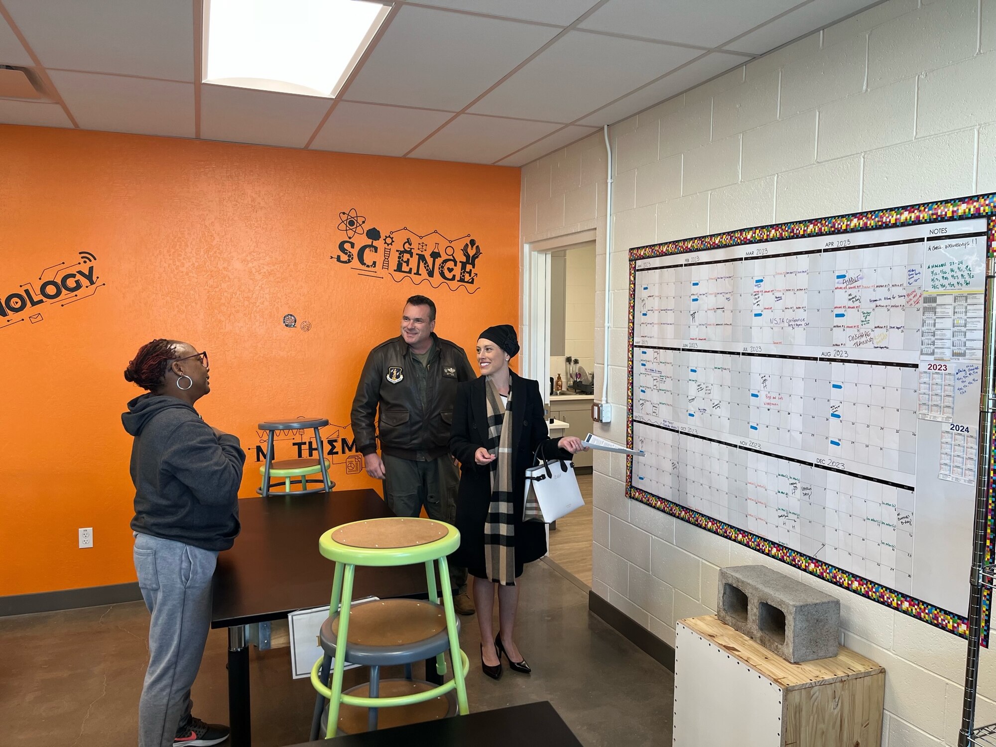 Col. Evan Kirkwood, 152nd Airlift Wing Commander, Trustee Beth Smith, Washoe County School Board District D and Tiffany Davis, StarBase Sierra Director tour the StarBase facilities located at the Nevada Air National Guard Base in Reno, Nev.