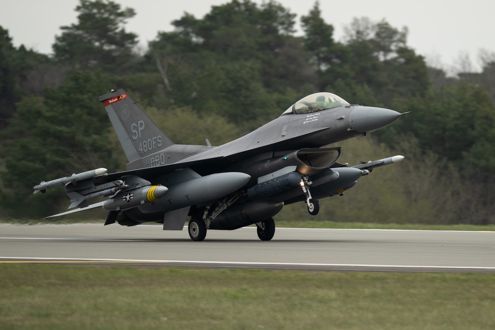 An F-16 aircraft lands.