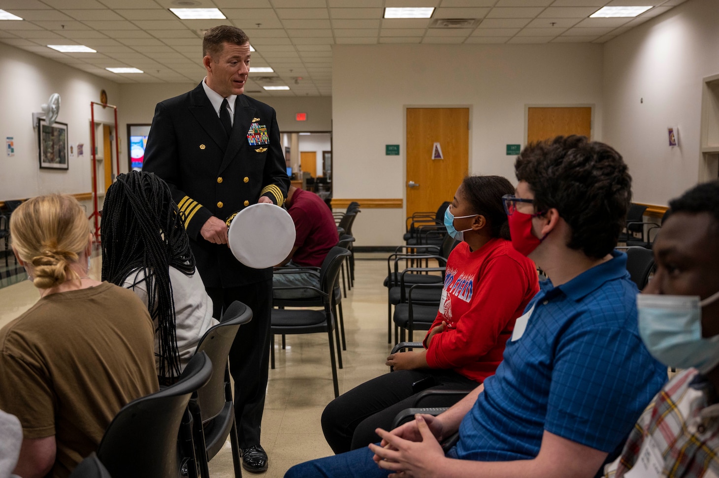 Capt. James Prouty, commanding officer of Navy Reserve Center Norfolk, visits a military entrance processing station.