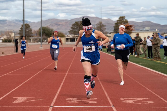 Photo of retired Air Force Reserve Staff Sgt. Nairi Cornejo running on a track.