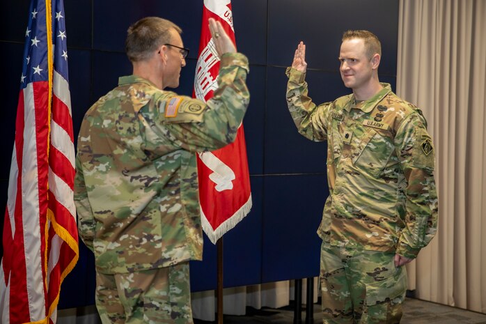 U.S. Army Corps of Engineers Galveston District Deputy Commander for Mega Projects Lt. Col. Ian O’Sullivan, right, recites the Oath of Commissioned Officers with District Commander Col. Rhett Blackmon during Lt. Col O’Sullivan’s promotion ceremony at the district headquarters.