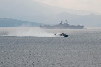 A U.S. Navy landing craft, air cushion, assigned to Assault Craft Unit (ACU) 5 transits Subic Bay during Balikatan 23.