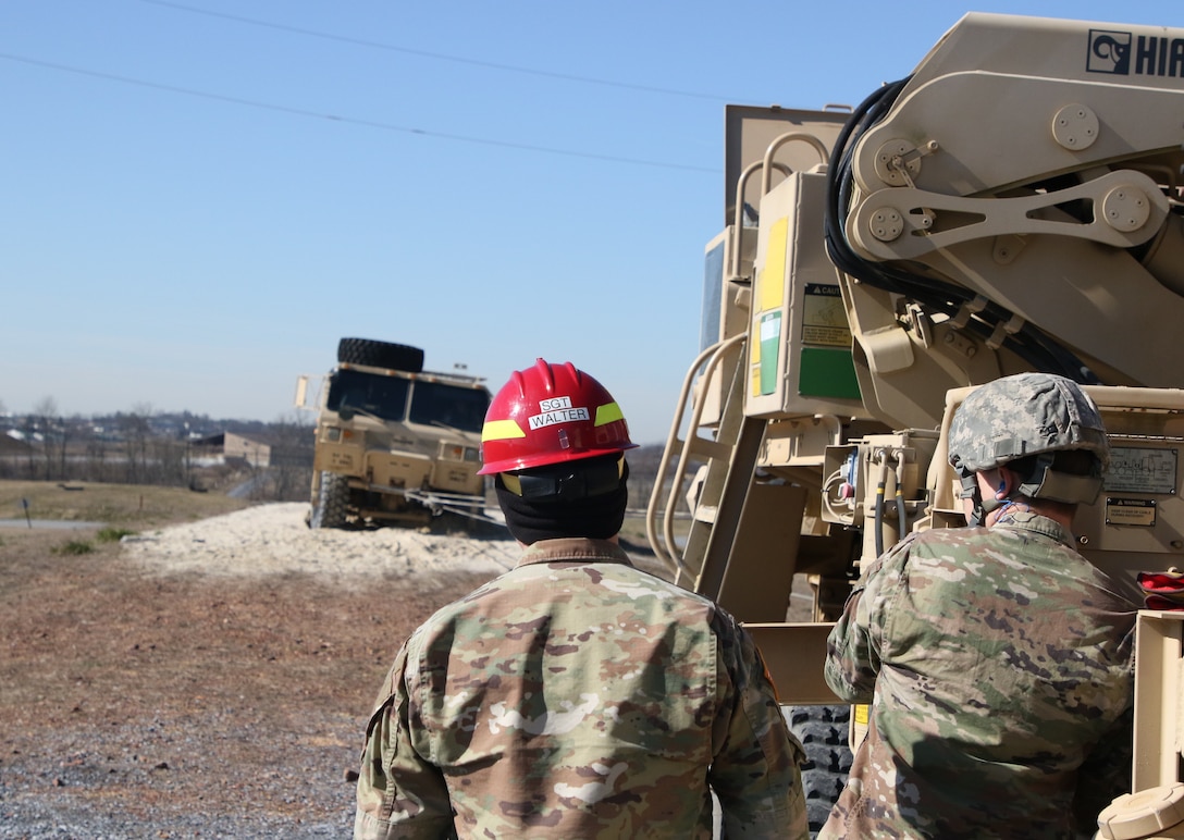 Sgt. Andrew Walker ensures Soldiers are safely and properly recovering the Light Medium Tactical Vehicle from the Mire Pit.
The 80th Training Command’s Regional Training Maintenance Site Fort Indian Town Gap graduated its most recent class of Wheeled Recovery Specialists, also known by the designation H8 (pronounced as “Hotel-8”)