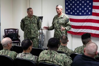 YOKOSUKA, Japan (April 7, 2023) Rear Adm. Pete Garvin, right, commander, Naval Education and Training Command (NETC), and Force Master Chief Rick Mengel, left, NETC’s force master chief, address Sailors during an all hands call at the NETC auditorium onboard Commander, Fleet Activities Yokosuka. NETC’S mission is to recruit, train and deliver those who serve our nation, taking them from street-to-fleet by forging civilians into highly skilled, operational and combat ready warfighters. (U.S. Navy photo by Mass Communication Specialist 1st Class Jamaal Liddell)