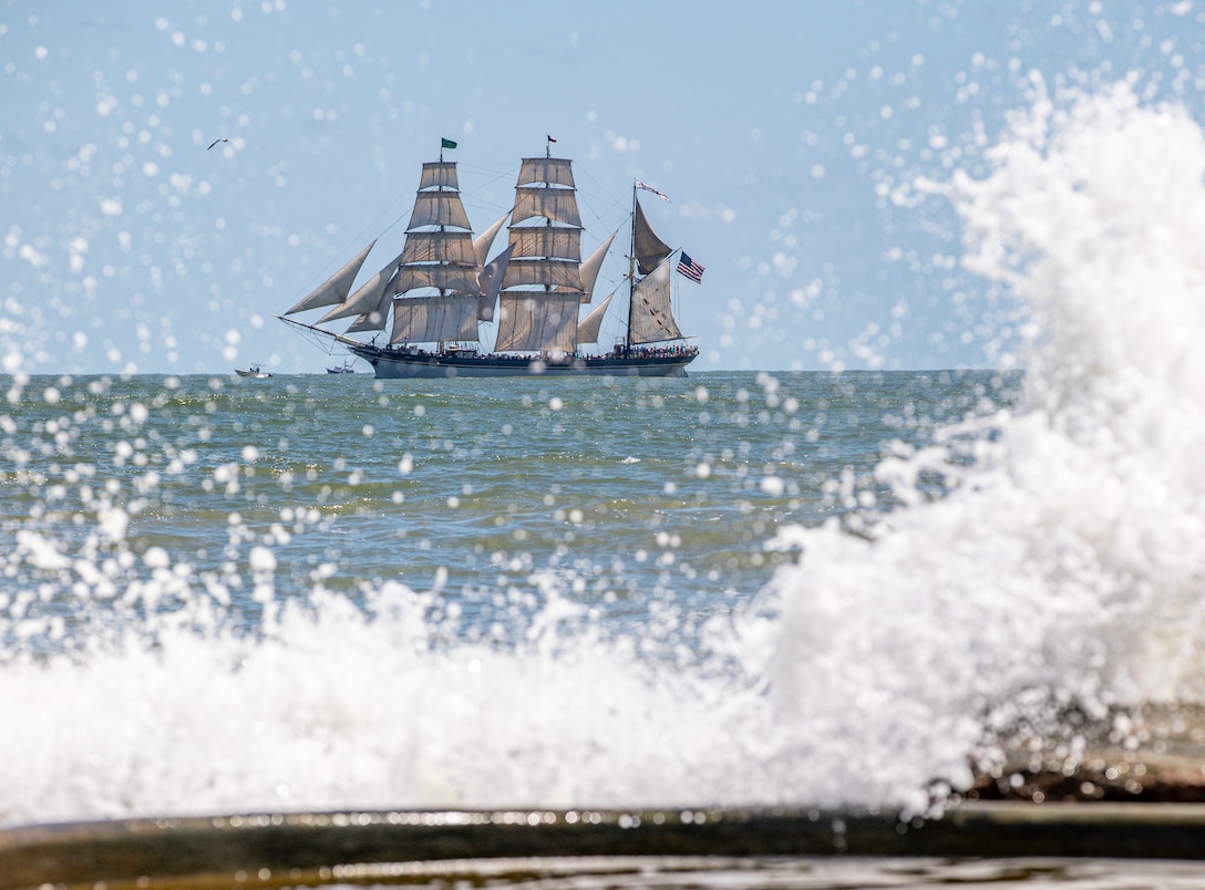 Elissa, a three-masted barque and one of three ships of her kind still active, transits the Gulf of Mexico off the coast of Galveston Beach during Tall Ships Challenge Galveston 2023.