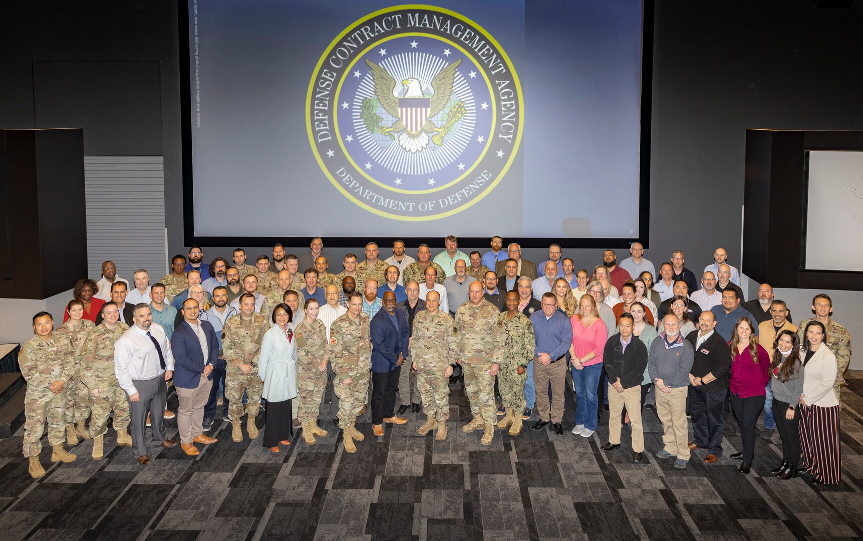Group photo of military and civilian personnel