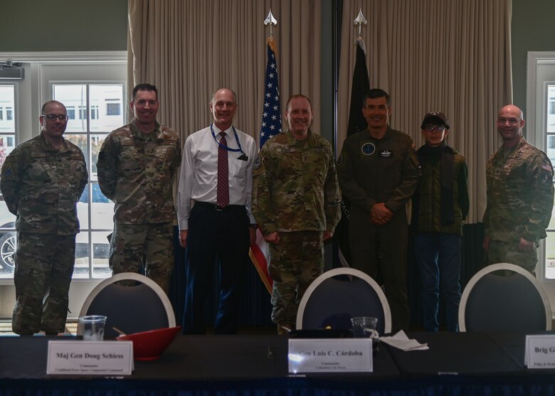 Members of the Space Launch Delta 30, Combined Force Space Component Command, Air Force South Command, and the Colombian Air Force command staff pose for a photo inside the Pacific Coast Club on Vandenberg Space Force Base, Calif., April 10, 2023. Gen. Luis C. Córdoba, Colombian Air Force commander, led a delegation of industry and academia representatives to witness the launch of COLAF's second-ever nanosatellite in partnership with EXOLAUNCH and SpaceX. (U.S. Space Force photo by Airman 1st Class Ryan Quijas)