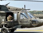 Sgt. 1st Class Kevin Novak, 1st Battalion, 168th General Support Aviation, assists the Royal Thai Army maintenance test pilots with diagnostic troubleshooting of the main rotor indications on a UH-60 Black Hawk March 21, 2023 in Lop Buri, Kingdom of Thailand.