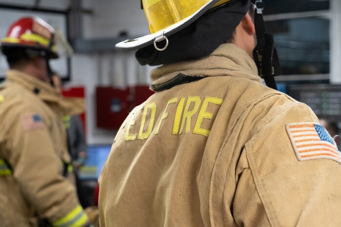 Federal Firefighters observe spill response actions from a control center on Joint Base Pearl Harbor-Hickam, Hawaii, during a April 6, 2023 spill response training exercise conducted by Joint Task Force-Red Hill (JTF-RH).