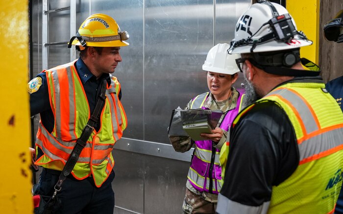 Joint Task Force-Red Hill (JTF-RH) Occupational Health and Safety Representative, U.S. Air Force Master Sgt. Karen O’Neal, talks with safety professionals from Naval Supply System Command and Joint Base Pearl Harbor-Hickam during a quality assurance walkthrough at the Red Hill Bulk Fuel Storage Facility (RHBFSF) in Halawa, Hawaii, April 11, 2023.