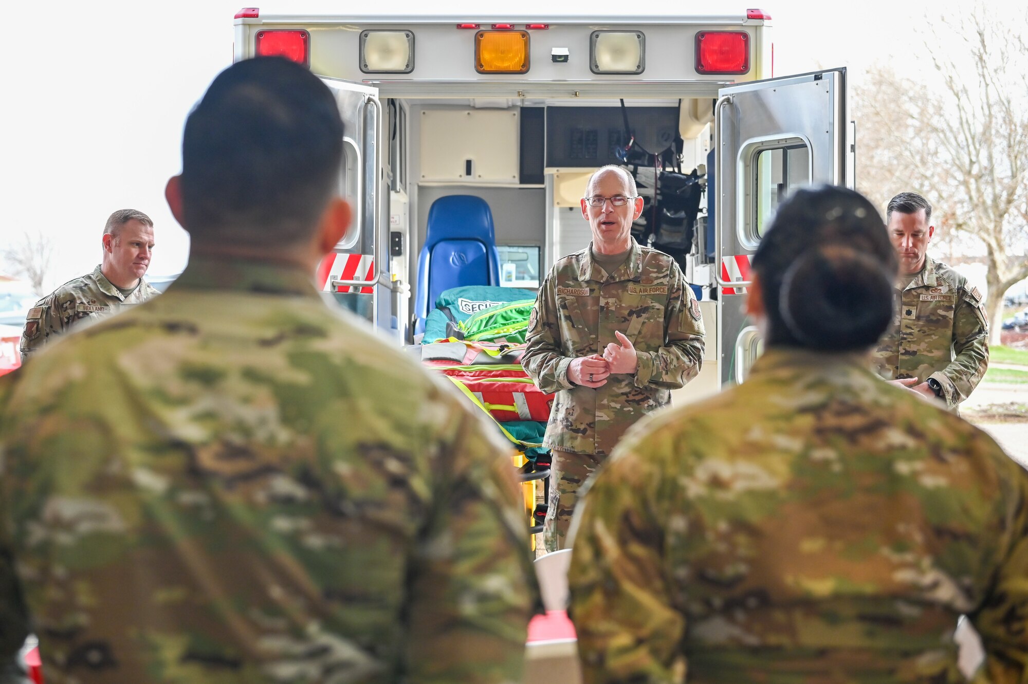 (Center) Gen. Duke Z. Richardson, Air Force Materiel Command commander, talks to members of 775th Civil Engineer Squadron Fire and Emergency Services, during a base visit April 12, 2023, at Hill Air Force Base, Utah.