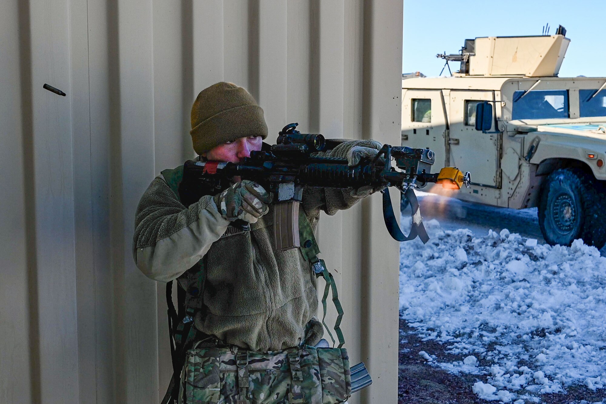 cadre member firing rifle
