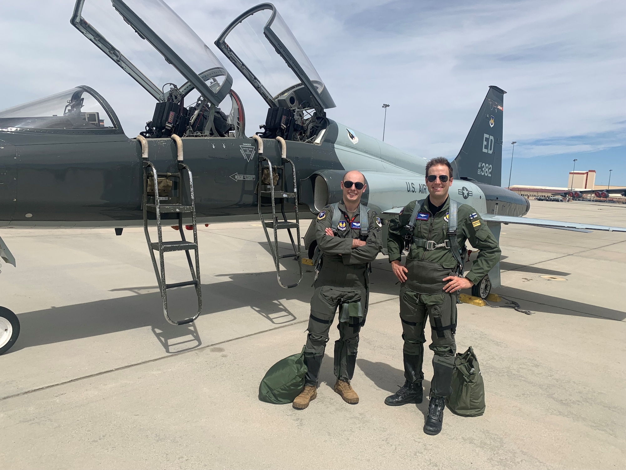 U.S. Air Force Test Pilot School Class 23A students Capt. Sami Nisonen of the Finnish Air Force and Capt. Jacob Olsen of the USAF pose for a photo after flying a T-38 Talon. This technical exchange at TPS develops long lasting individual friendships between the USAF students and their foreign partner classmates.
