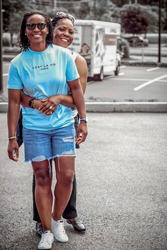Image of two people posing for a photo.