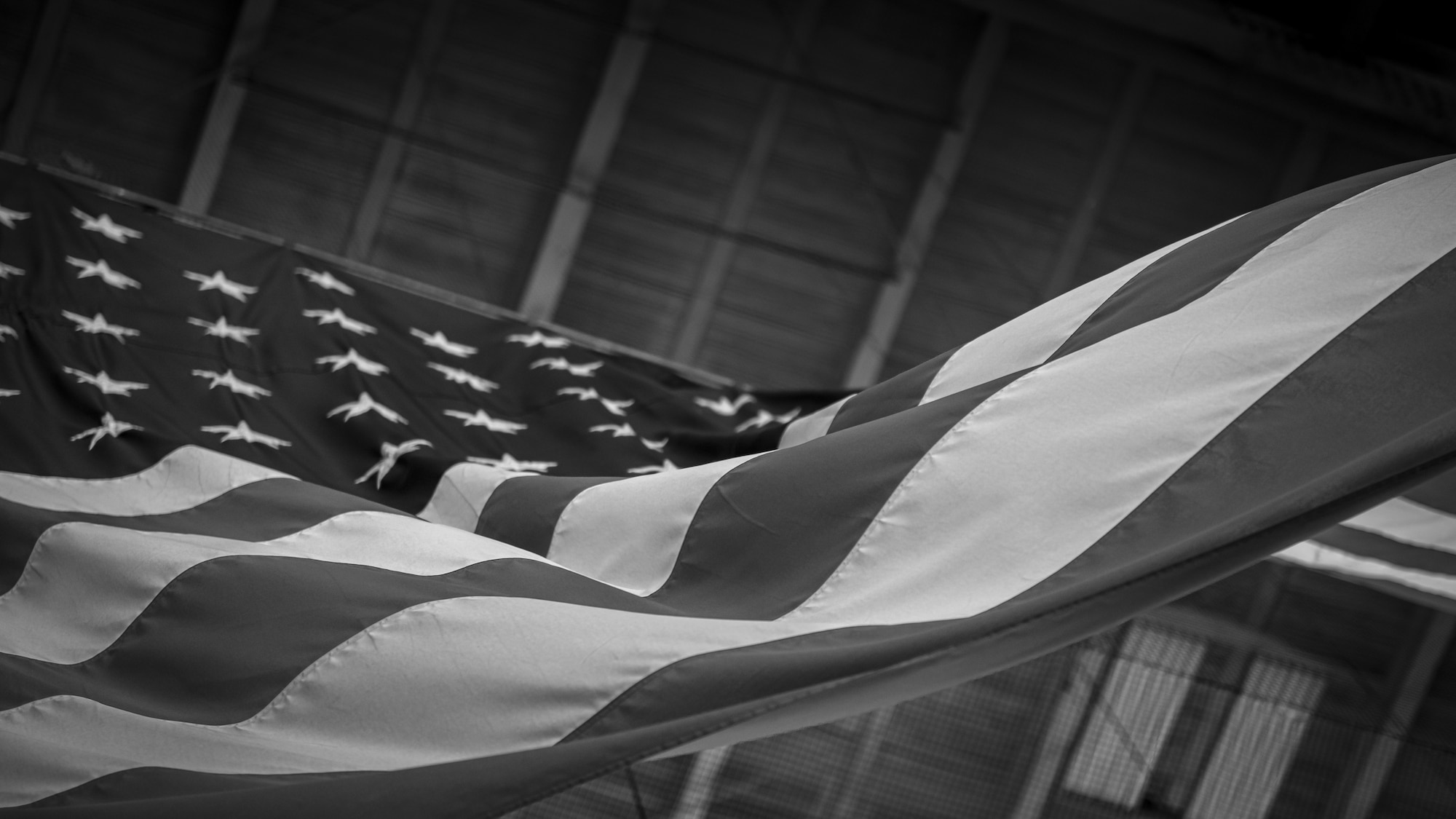 The American flag is displayed in a hangar at MacDill Air Force Base, Florida, April 12, 2023. MacDill is located seven miles south of Tampa, Florida, on the southwestern tip of the Interbay peninsula in Hillsborough County. This area once had been used as a military staging area during the Spanish-American War but did not become a military installation until much later. (U.S. Air Force photo by Senior Airman Lauren Cobin)