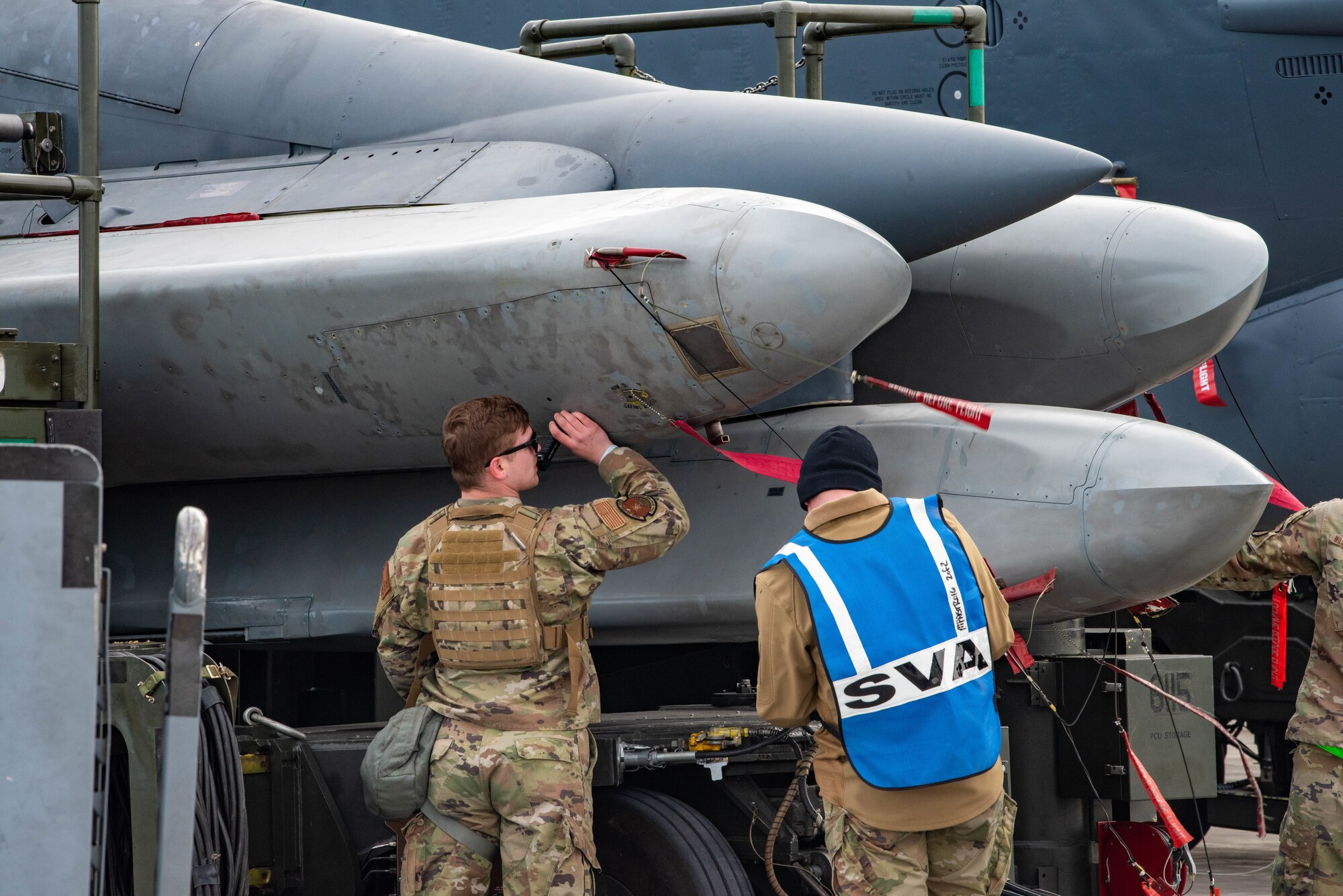 Munitions Airmen arm B-52s during Global Thunder 23