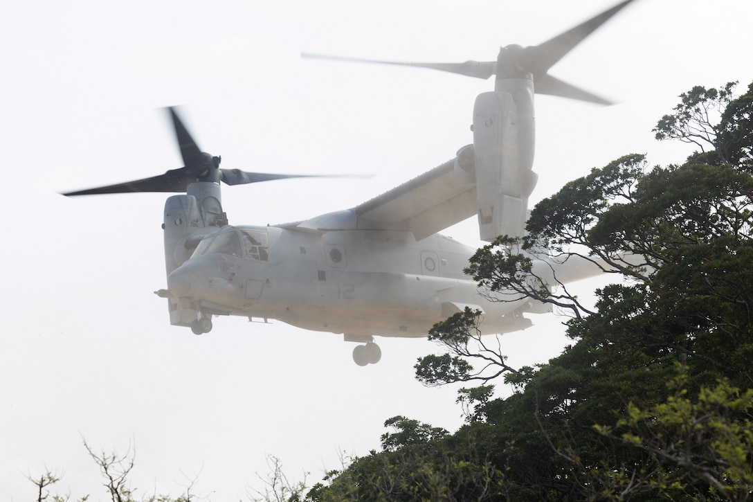 U.S. Marine Corps pilots with Marine Medium Tiltrotor Squadron 265 (Rein.), 31st Marine Expeditionary Unit fly an MV-22B Osprey to a landing zone during a forward arming and refueling point exercise at Camp Hansen, Okinawa, Japan, April 12, 2023. A FARP is used to extend the capabilities of rotary or fixed wing aircrafts to allow rearming and refueling without having to fall back to a forward operating base. The 31st MEU, the Marine Corps’ only continuously forward-deployed MEU, provides a flexible and lethal force ready to perform a wide range of military operations as the premier crisis response force in the Indo-Pacific region. (U.S. Marine Corps photo by Lance Cpl. Elijah Murphy)