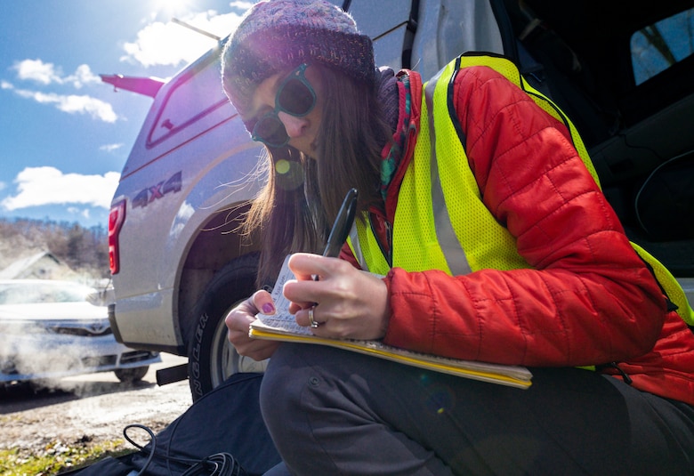 Andi Fitzgibbon, a biologist with the U.S. Army Corps of Engineers Pittsburgh District’s Water Quality team, records field data from water samples to determine the water quality’s “sound,” which measures temperature and related parameters such as dissolved oxygen chlorophyll turbidity near Warren, Pennsylvania on March 30, 2023. The district’s Water Quality team collected water samples from the Allegheny River both before and after the spring pulse to compare the pulse’s effect along various points on the river. The collected samples are sent to the Corps of Engineers Research and Development Center to test and analyze myriad factors such as pH acidity, alkalinity, metals, nutrients, and conductivity. (U.S. Army Corps of Engineers Pittsburgh District photo by Andrew Byrne)