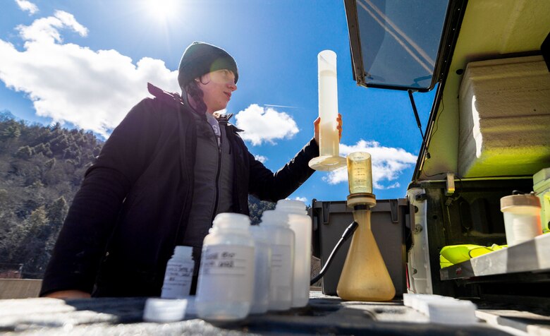 Destinee Davis, a biologist with the U.S. Army Corps of Engineers Pittsburgh District’s Water Quality team, tests a chlorophyll sample at a mobile testing apparatus near Warren, Pennsylvania, March 30, 2023. The district’s Water Quality team collected water samples from the Allegheny River both before and after the spring pulse to compare the pulse’s effect along various points on the river. The collected samples are sent to the Corps of Engineers Research and Development Center to test and analyze myriad factors such as pH acidity, alkalinity, metals, nutrients, and conductivity. (U.S. Army Corps of Engineers Pittsburgh District photo by Andrew Byrne)