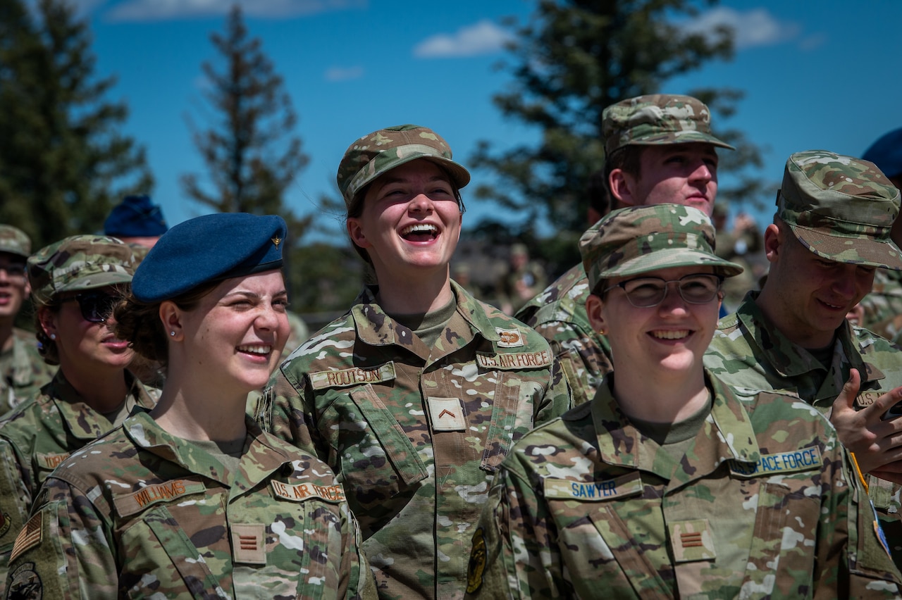 Cadets look up toward the sky.